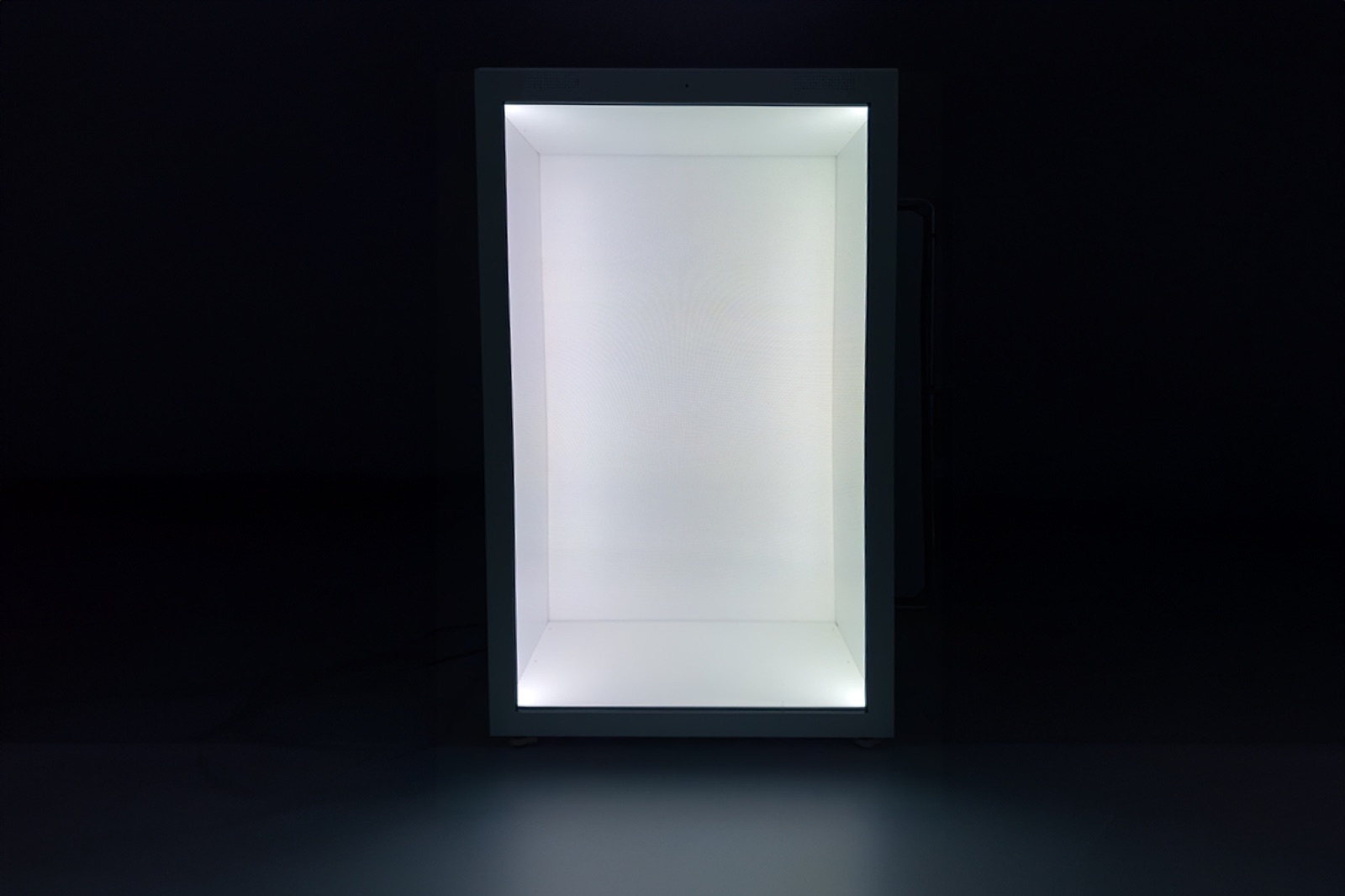 Empty HoloChron Box, illuminated spatial-effect space