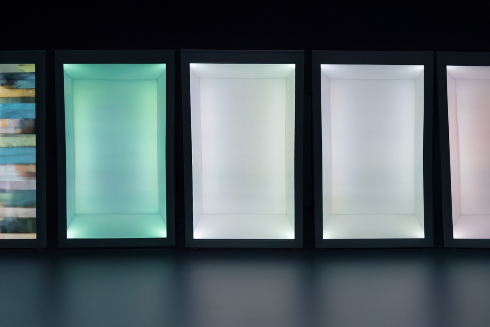 HoloChron Box in a gallery space with two characters