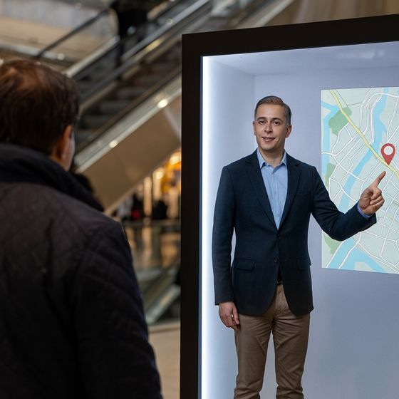 Assistant giving directions with a map